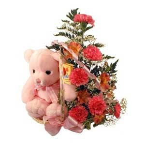 Flower and teddy arrangement to welcome a new baby and congratulate the new parents