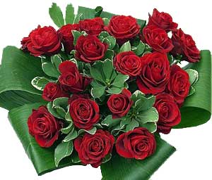 Red Roses hand tied in a stunning bouquet to say I love you, anytime!